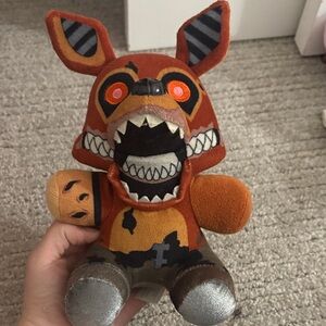 Funko Orange and Silver Stuffed Animal